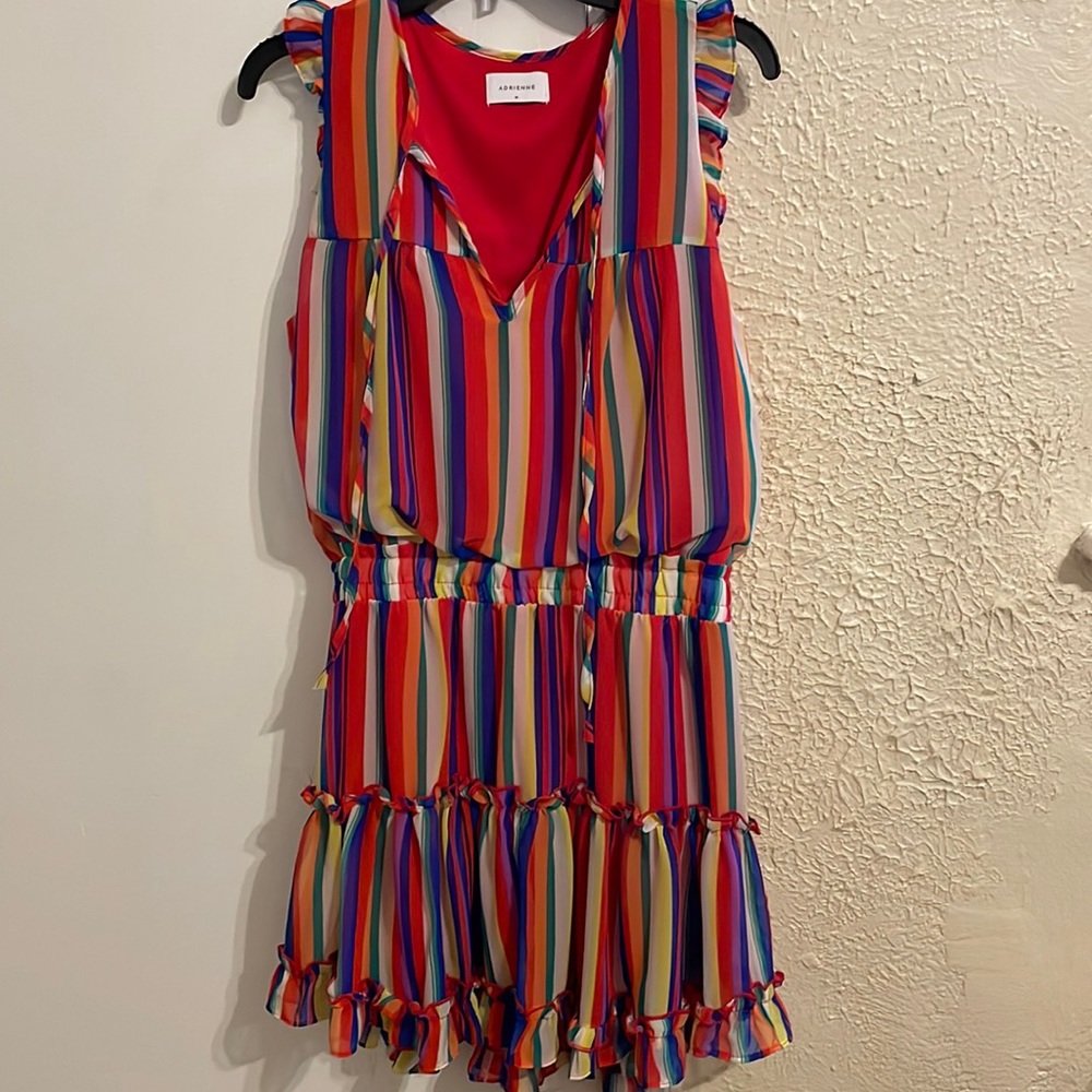This is a beautiful fiesta dress that is super flattering and never been worn!